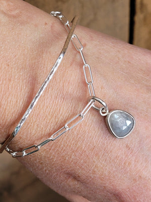 Open image in slideshow, Natural Gray Rosecut Sapphire charm set in Sterling Silver on a Paperclip Bracelet or Necklace

